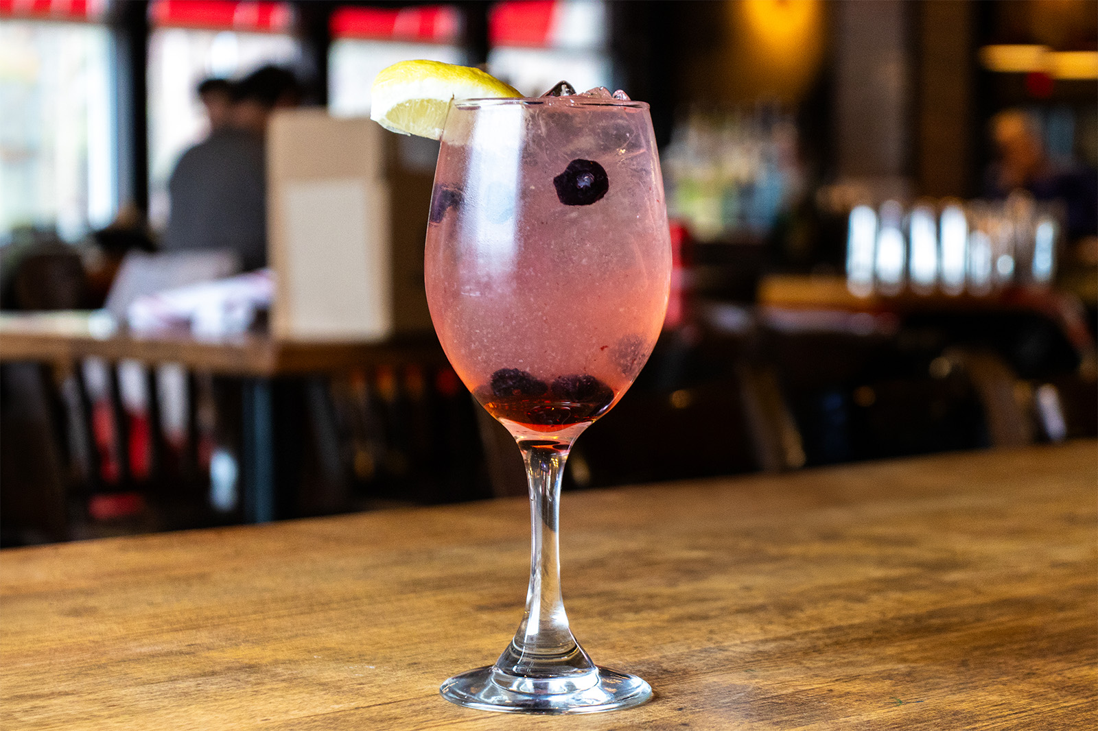 Blueberry sangria with a lemon on the side