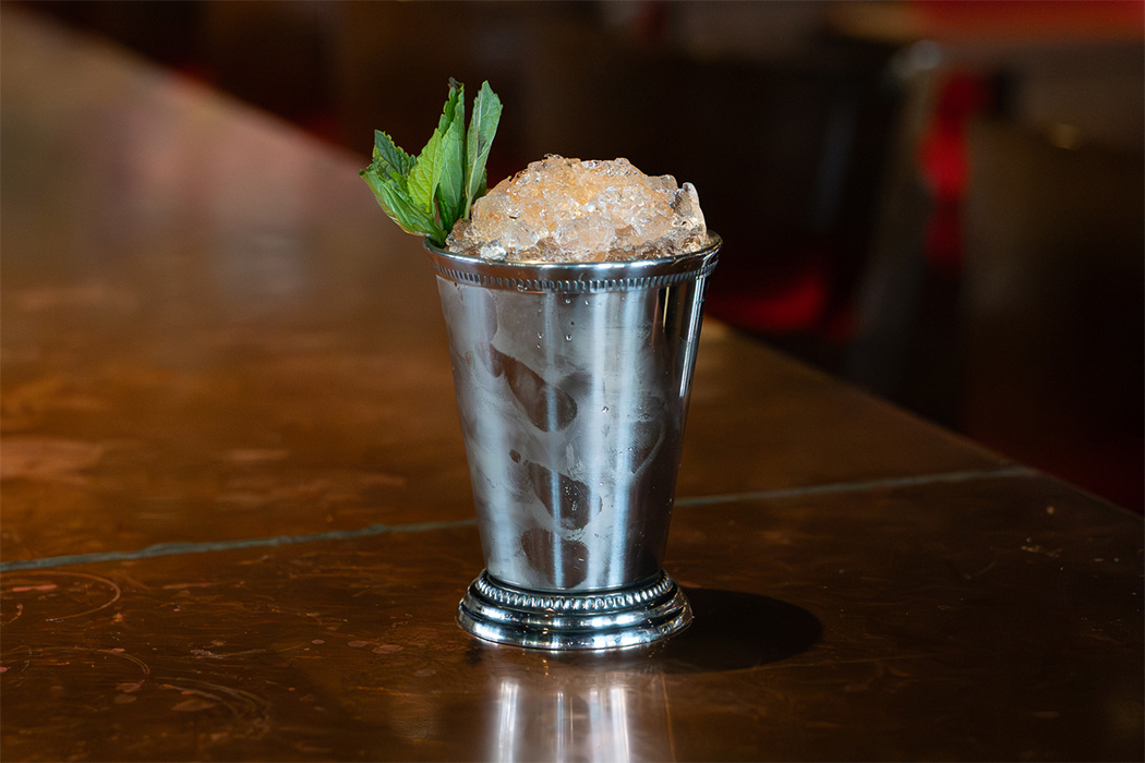 Day at the Derby is made with sazerac rye whiskey, sweet tea syrup, mint, and angostura bitters